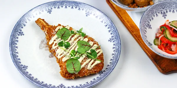 crispy pork cutlet with truffle mayo and parmesan,