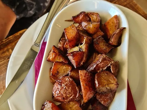 Patate al forno risaltate al burro della Latteria Di Crodo