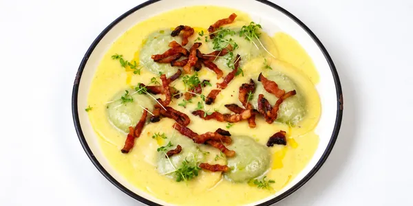 hand-folded ravioli filled with ricotta and spinach,