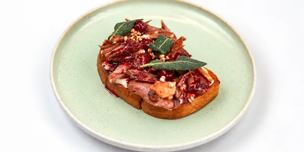 brioche with confit pulled duck,