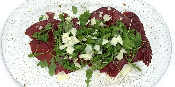 Carpaccio di Chianina rucola e Grana